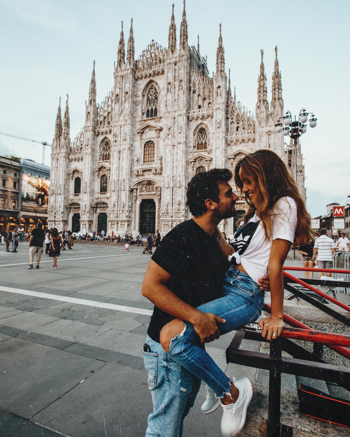 A Couple Poses Outside the Arc De Triomphe in Paris, France Stock Image -  Image of light, trafficm: 115467665